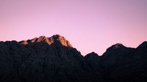 Breathtaking view of Mount Sinai's rugged peaks at sunset in Sharm El-Sheikh, Egypt.